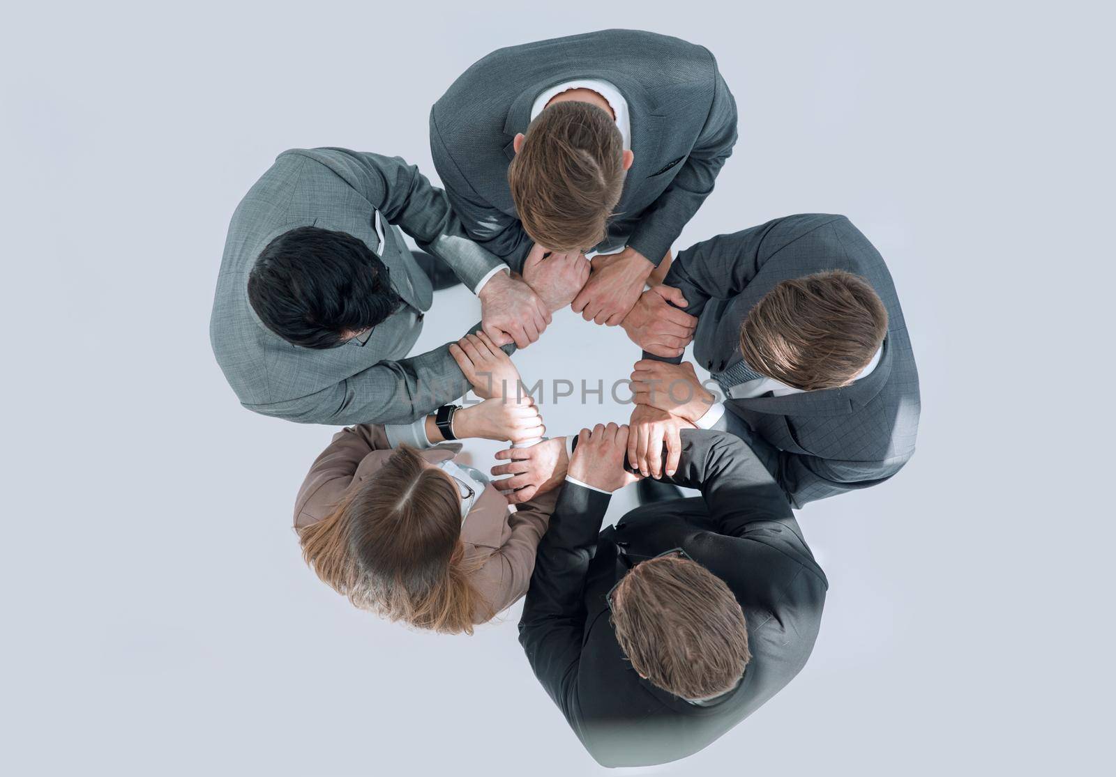 top view .business team standing in a circle .the concept of teamwork