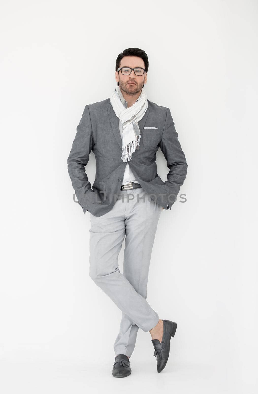 full height .pensive man in a scarf.photo with copy space