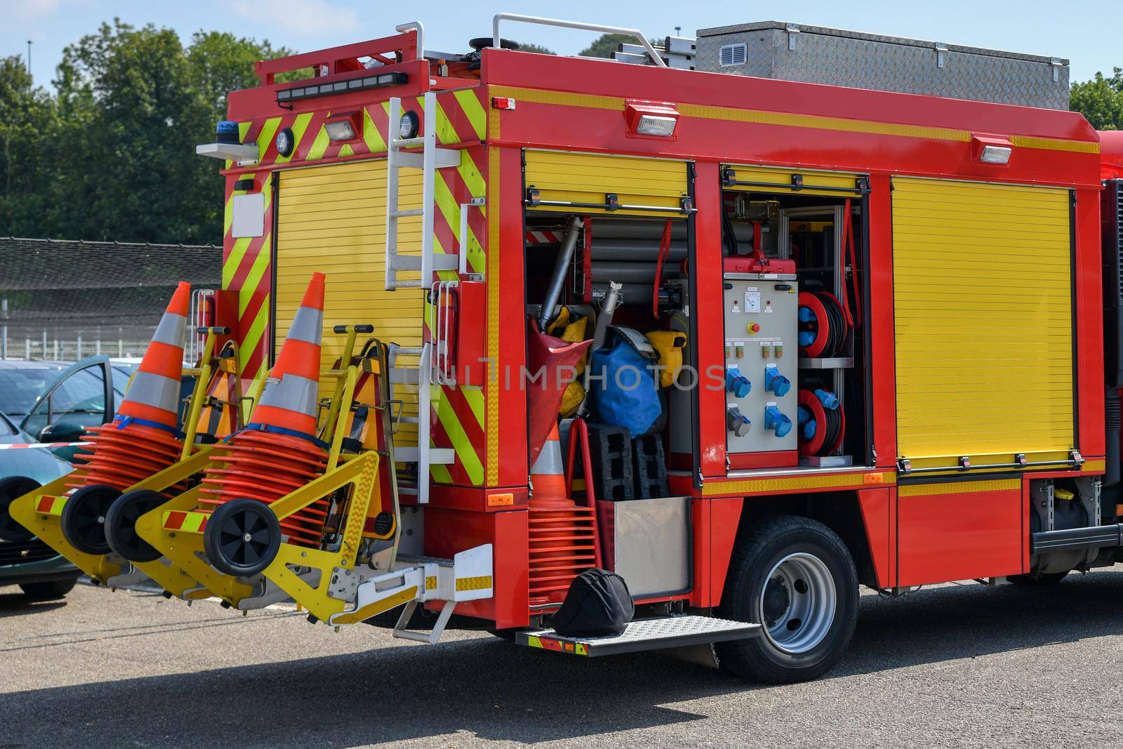 Big red fire engine with fire equipment