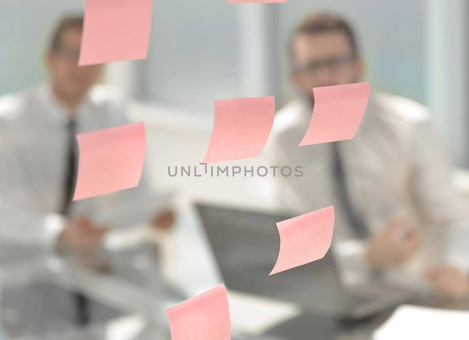 close up.two thoughtful employees sitting at a Desk.business concept