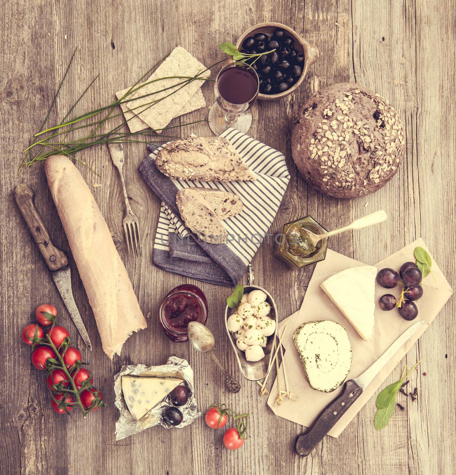 French snacks on a wooden background by tan4ikk1