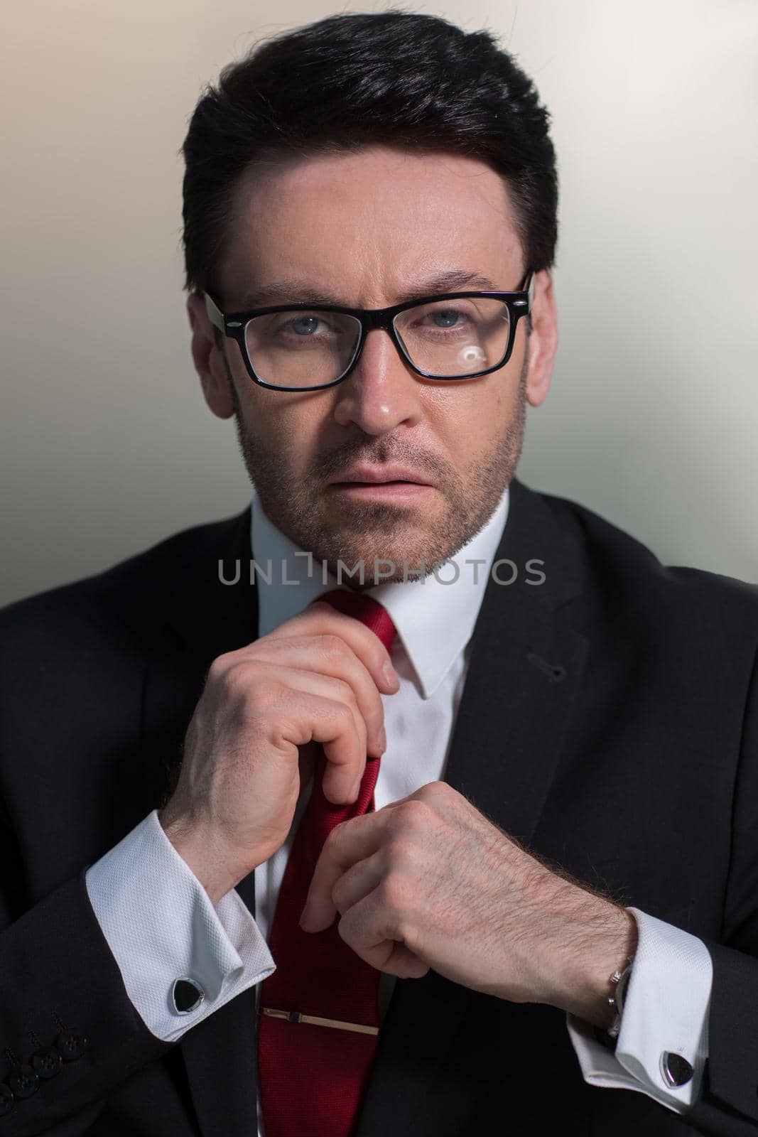 close up.businessman adjusting his tie.business people