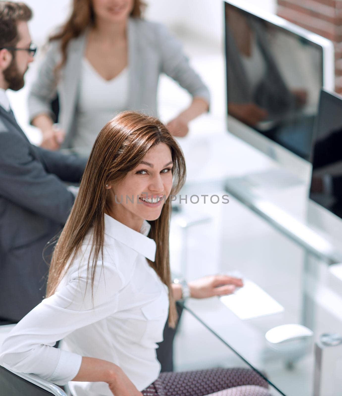 attractive business woman in the workplace in the office by asdf