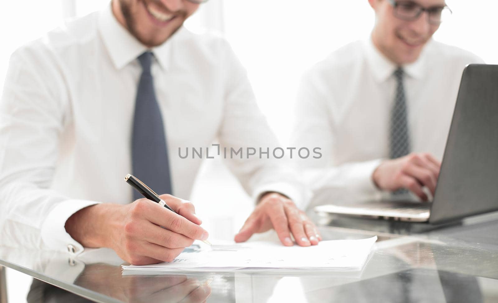 close up.businessman checking financial report.business concept