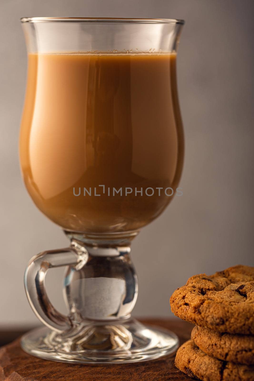 Coffee break composition with glass coffee with milk. Toned photo