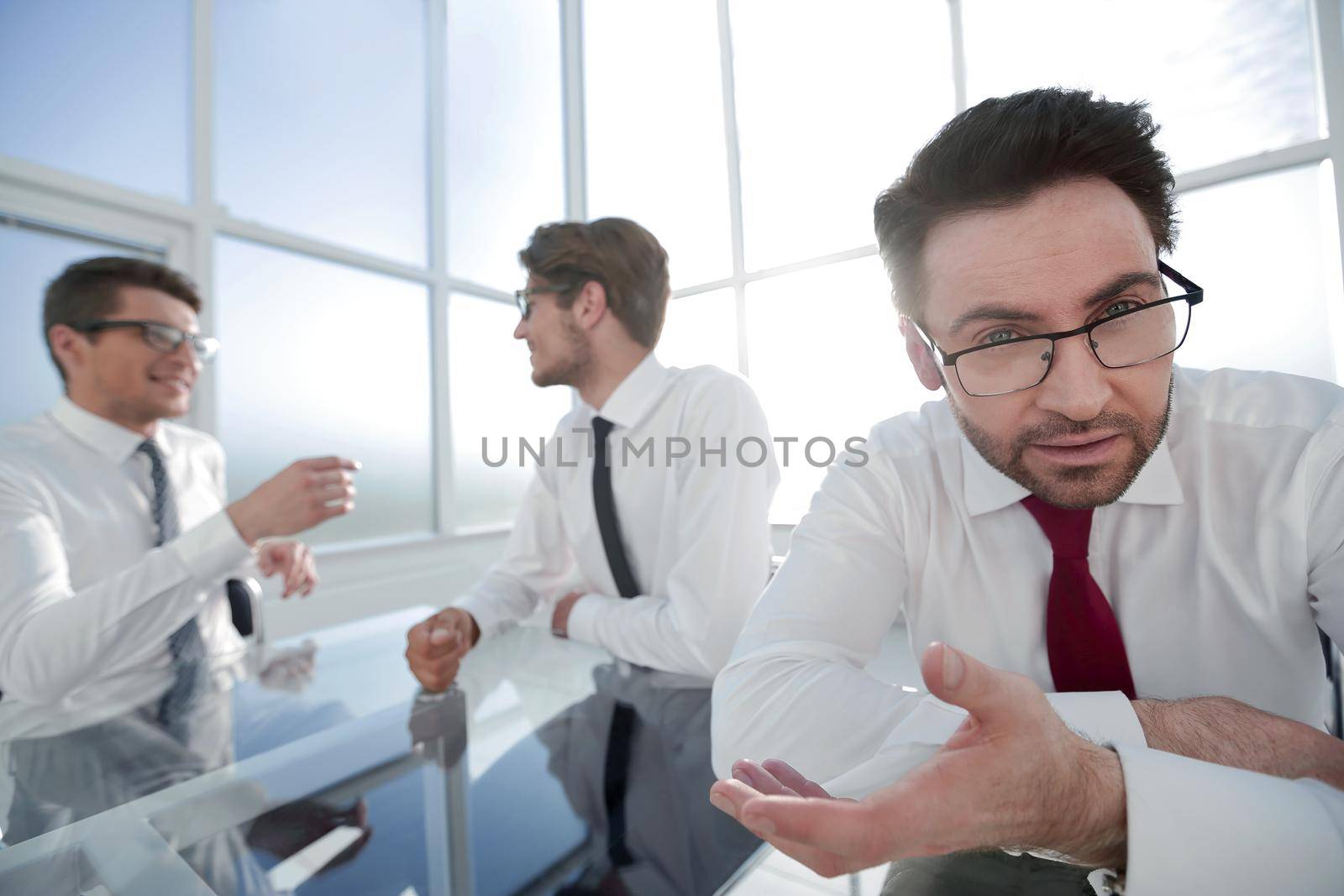 experienced lawyer in the background of his office by asdf