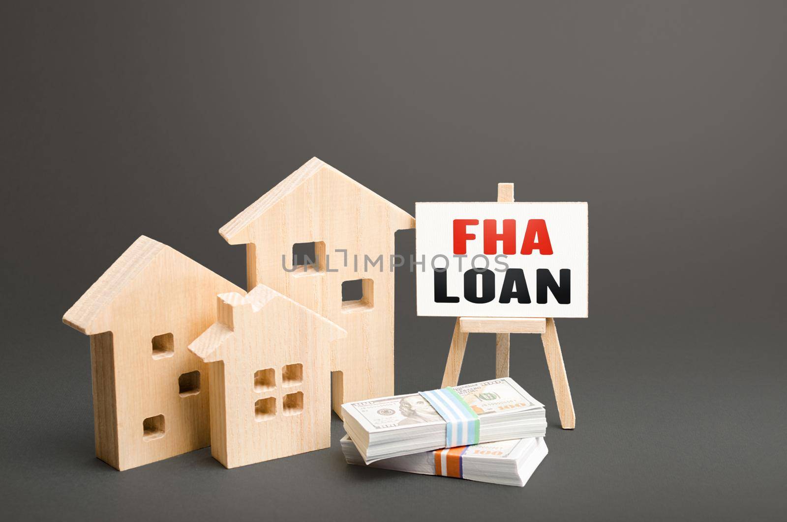 Residential buildings and easel with FHA loan. Mortgage insured by Federal Housing Administration Loan. An affordable financial instrument for borrowers with a low credit score. High risk of default by iLixe48