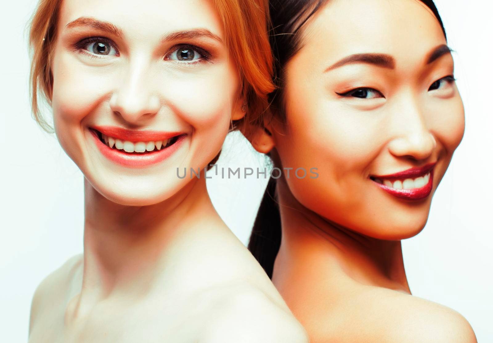 different nation woman: caucasian and asian together isolated on white background happy smiling, diverse type on skin, lifestyle people concept by JordanJ