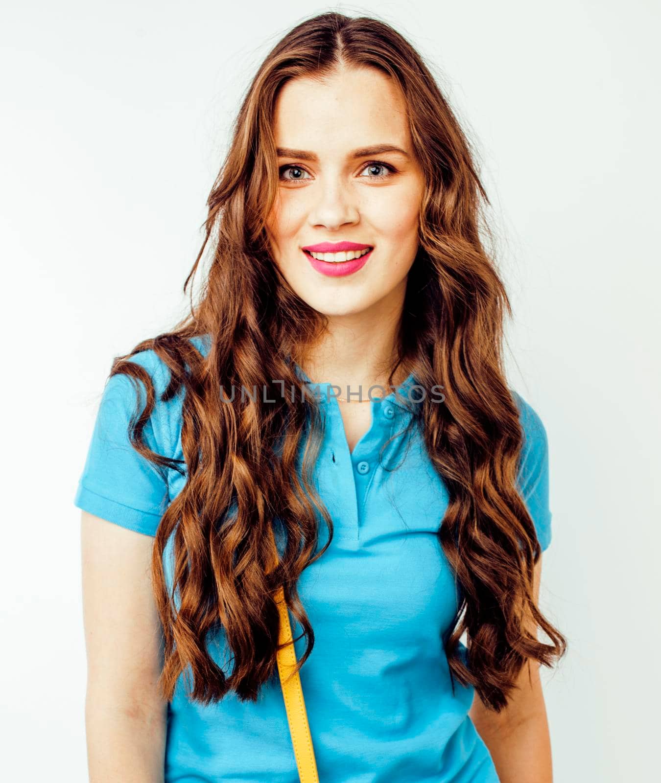 young pretty stylish brunette hipster girl posing emotional isolated on white background happy smiling cool smile, lifestyle people concept close up