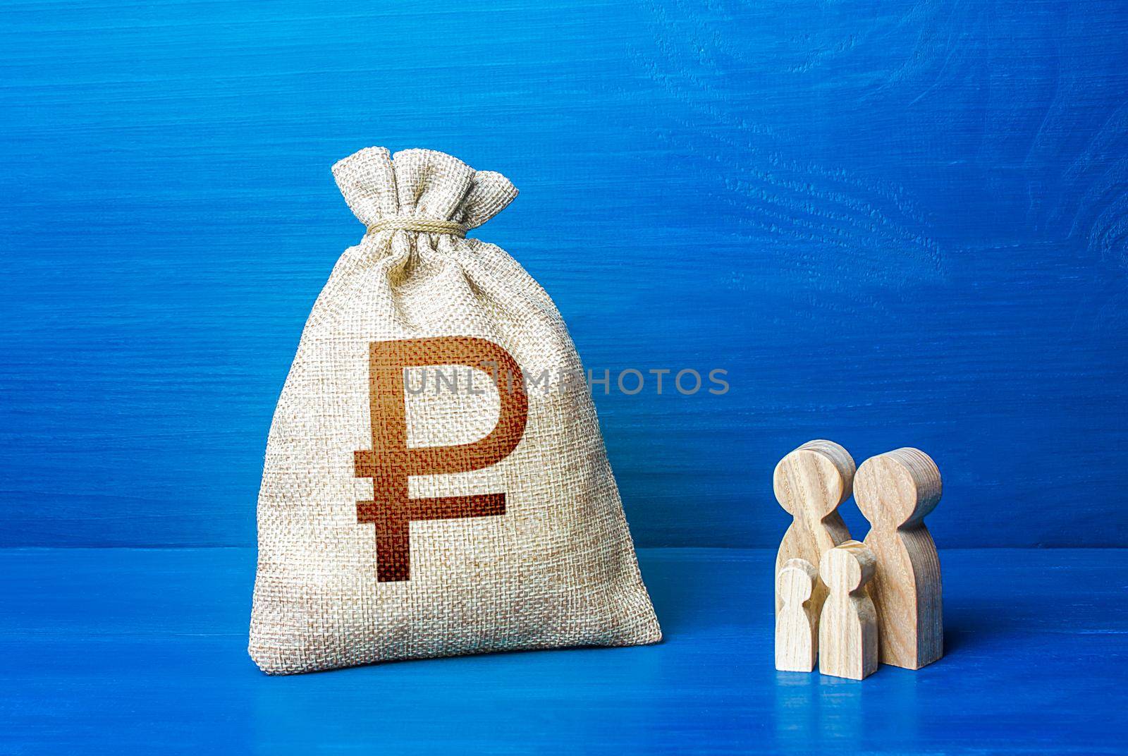 Family figurines and russian ruble money bag. Family budget. Investment in human capital. Income, expenses. Medicine and demography. Refugees crisis. Favorable conditions for population growth. by iLixe48