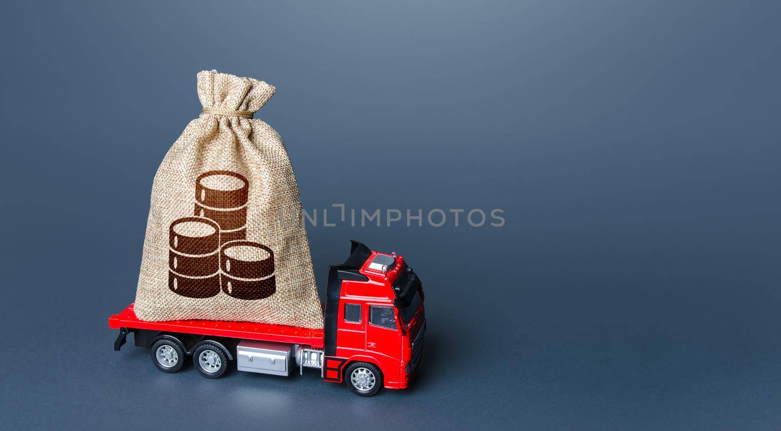 Truck with a money bag. Loan or deposit. Financial aid, investments and subsidies. Compensation. High super income. Payment of taxes. Debt load. Cash collection. Money transfers and transactions.