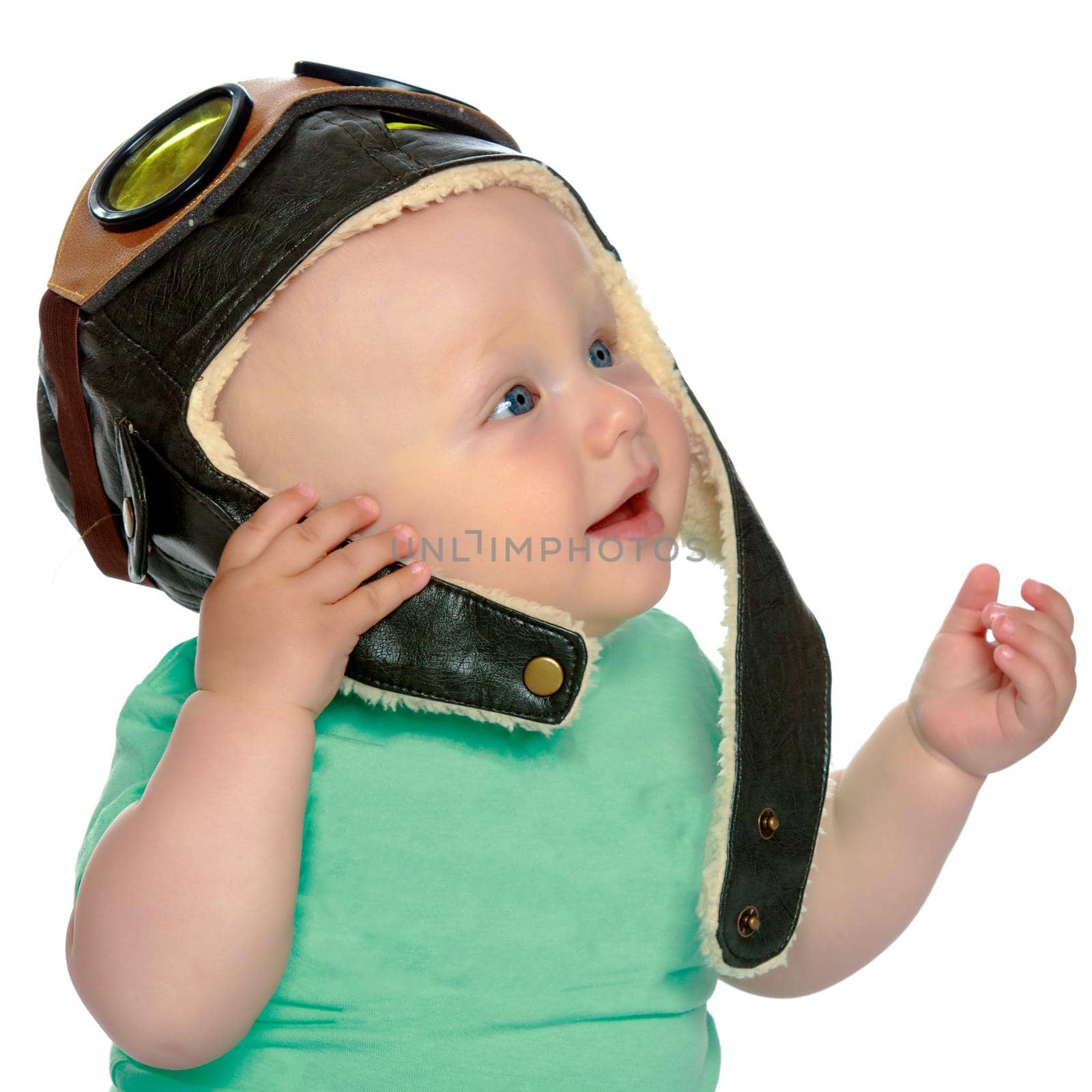 Cute little boy in helmet pilot. The concept of a happy childhood, the development of a child in the family. Isolated on white background.
