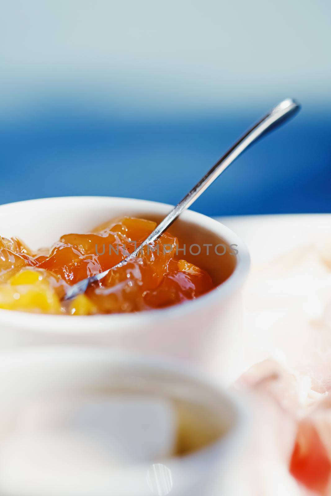 Breakfast outdoors in summer, ham, jam, butter and ham by Anneleven