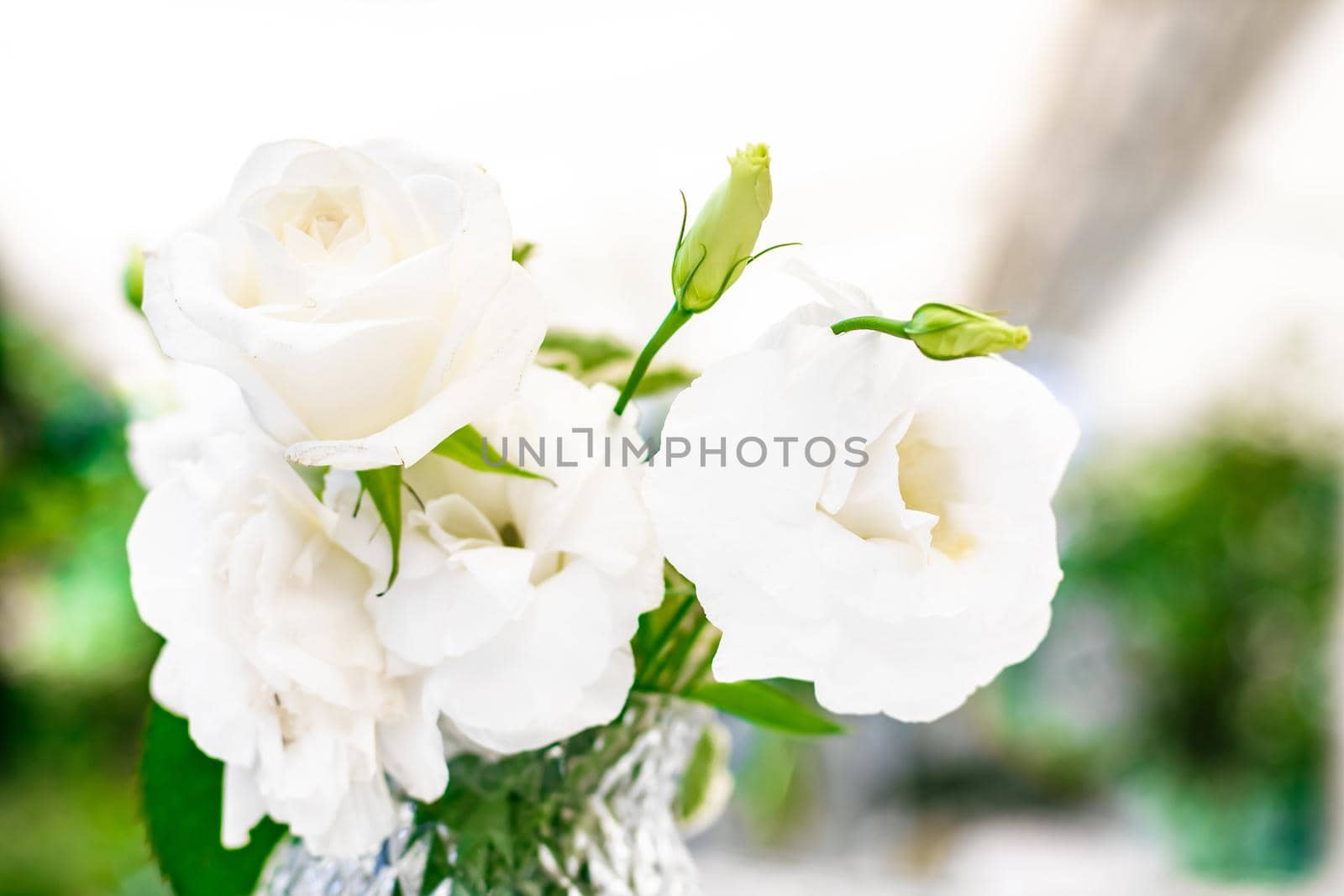 Wedding decoration, table decor and floral beauty, bouquet of white roses in luxury restaurant, beautiful flowers from summer garden.