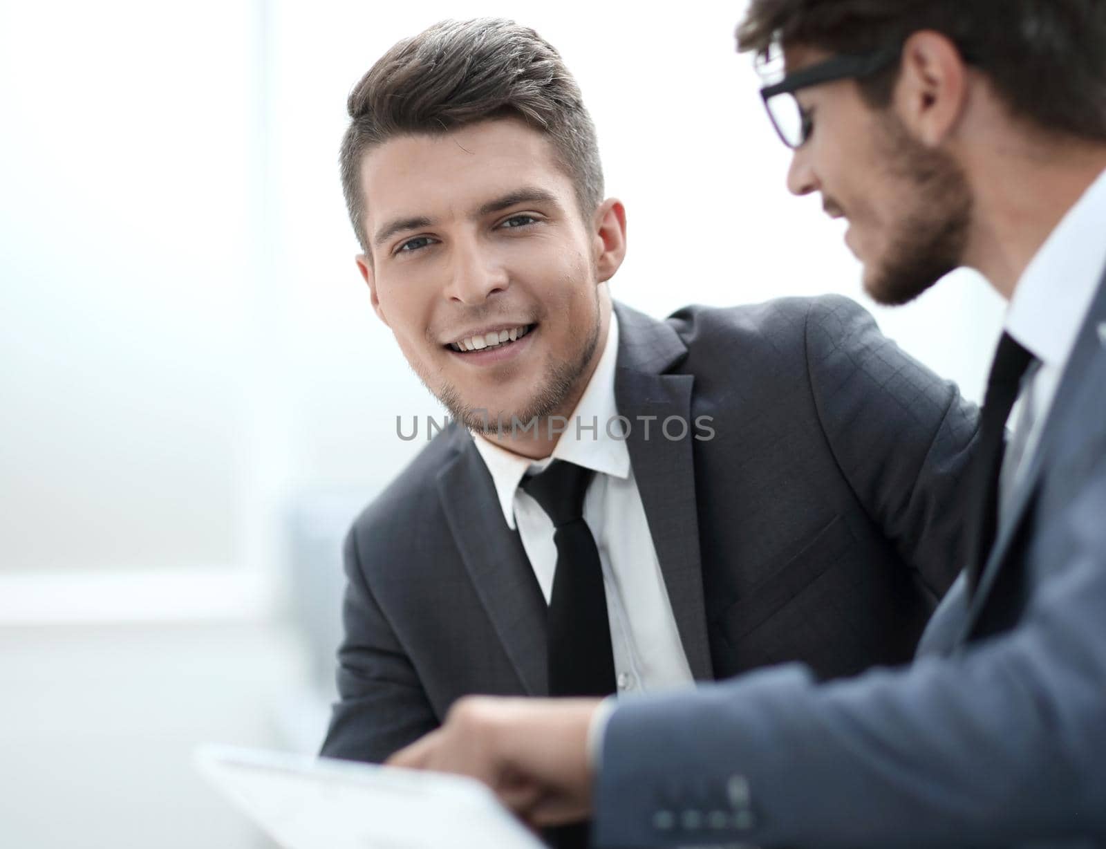 Image of two successful business partners working at meeting in office.concept of developed business