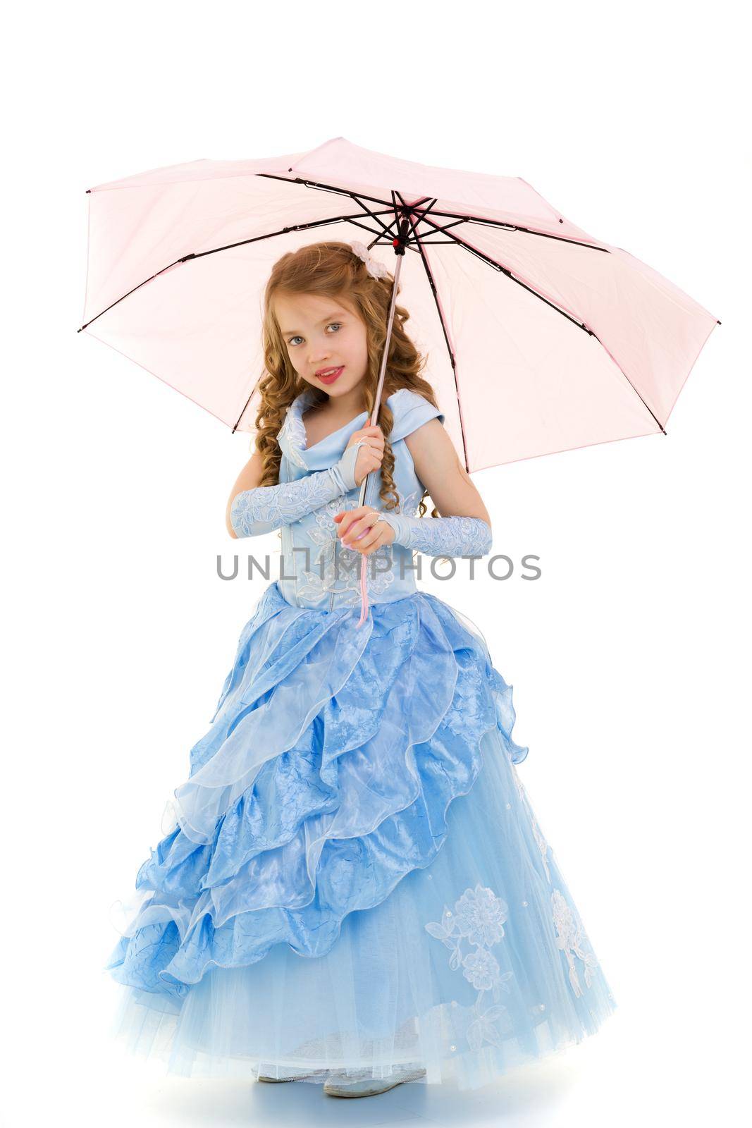 Beautiful little girl princess, in a long dressy dress under an umbrella. Concerts style and fashion. Isolated on white background.