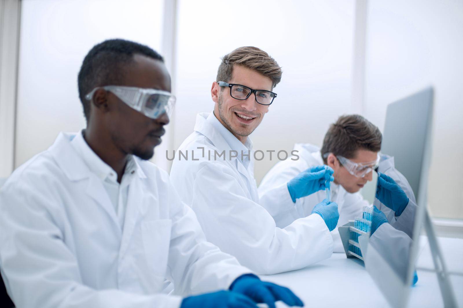 promising scientist working on a computer in the laboratory.science and technology