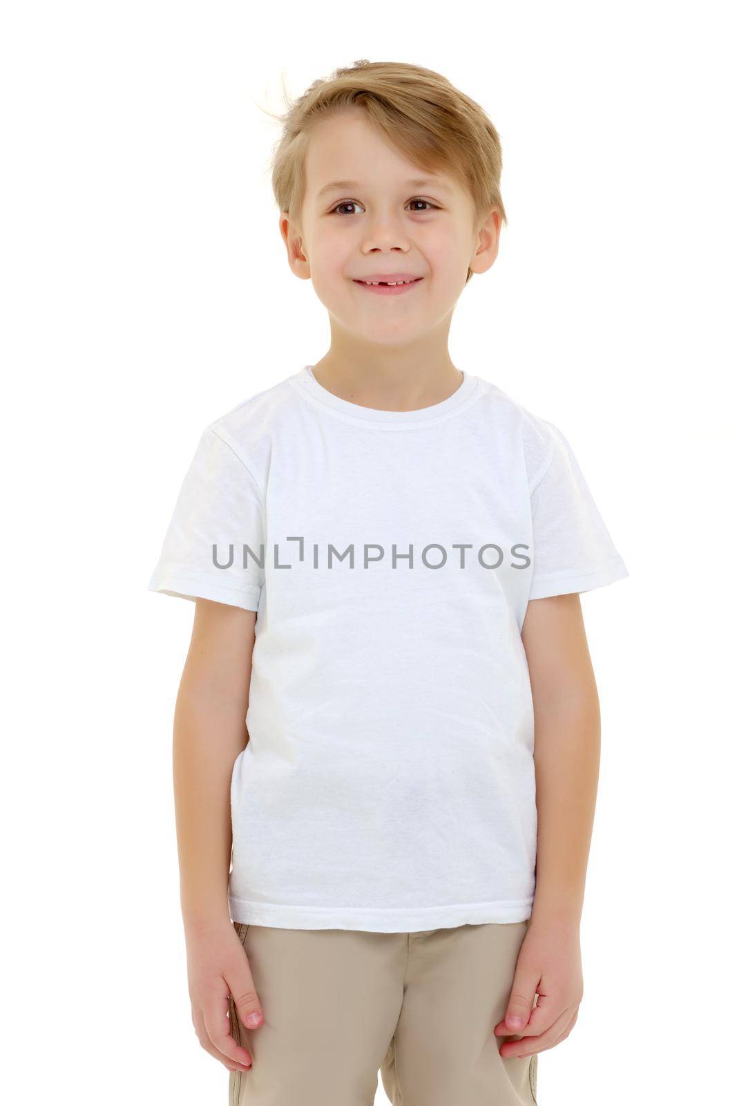 A cute, emotional little boy in a clean white t-shirt. On which you can write a company logo or advertising inscription. The concept of sale and promotion of children's products. Isolated on white background.