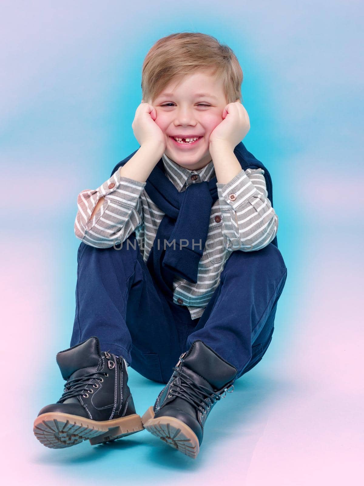 Handsome little boy laughing. by kolesnikov_studio