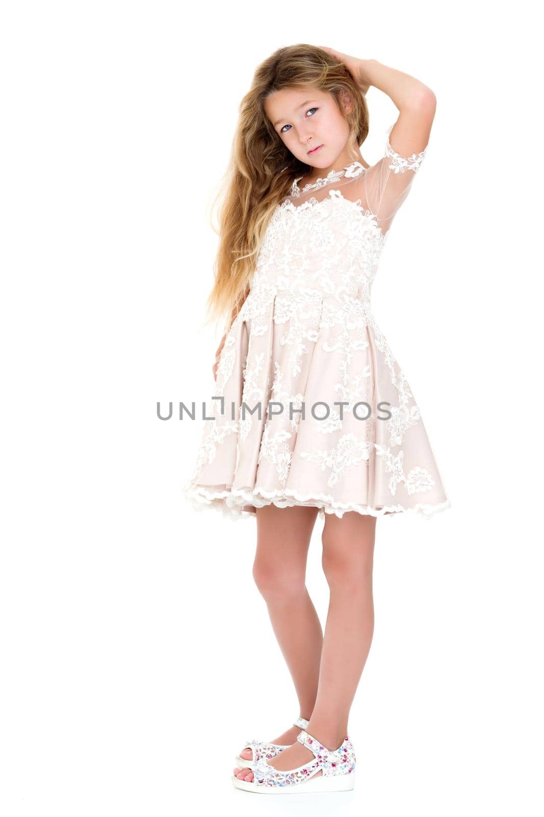 Little girl in an elegant dress. by kolesnikov_studio