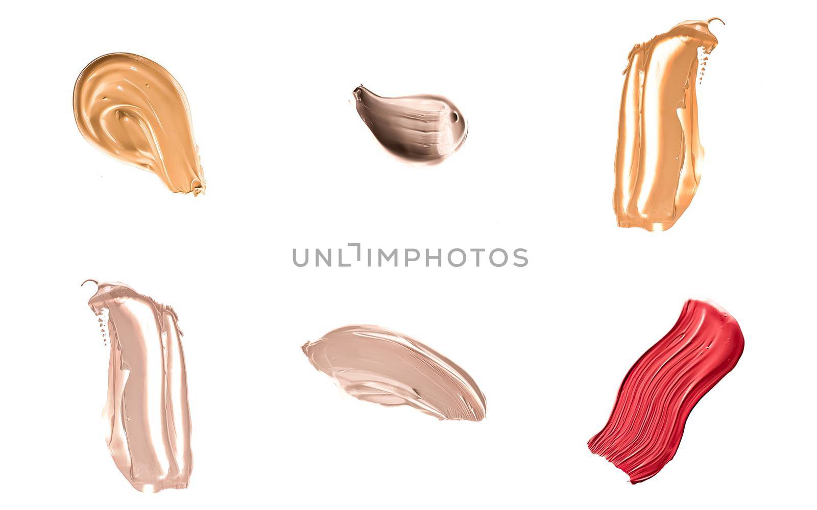 Set of art brush strokes or cosmetic makeup samples isolated on white background.