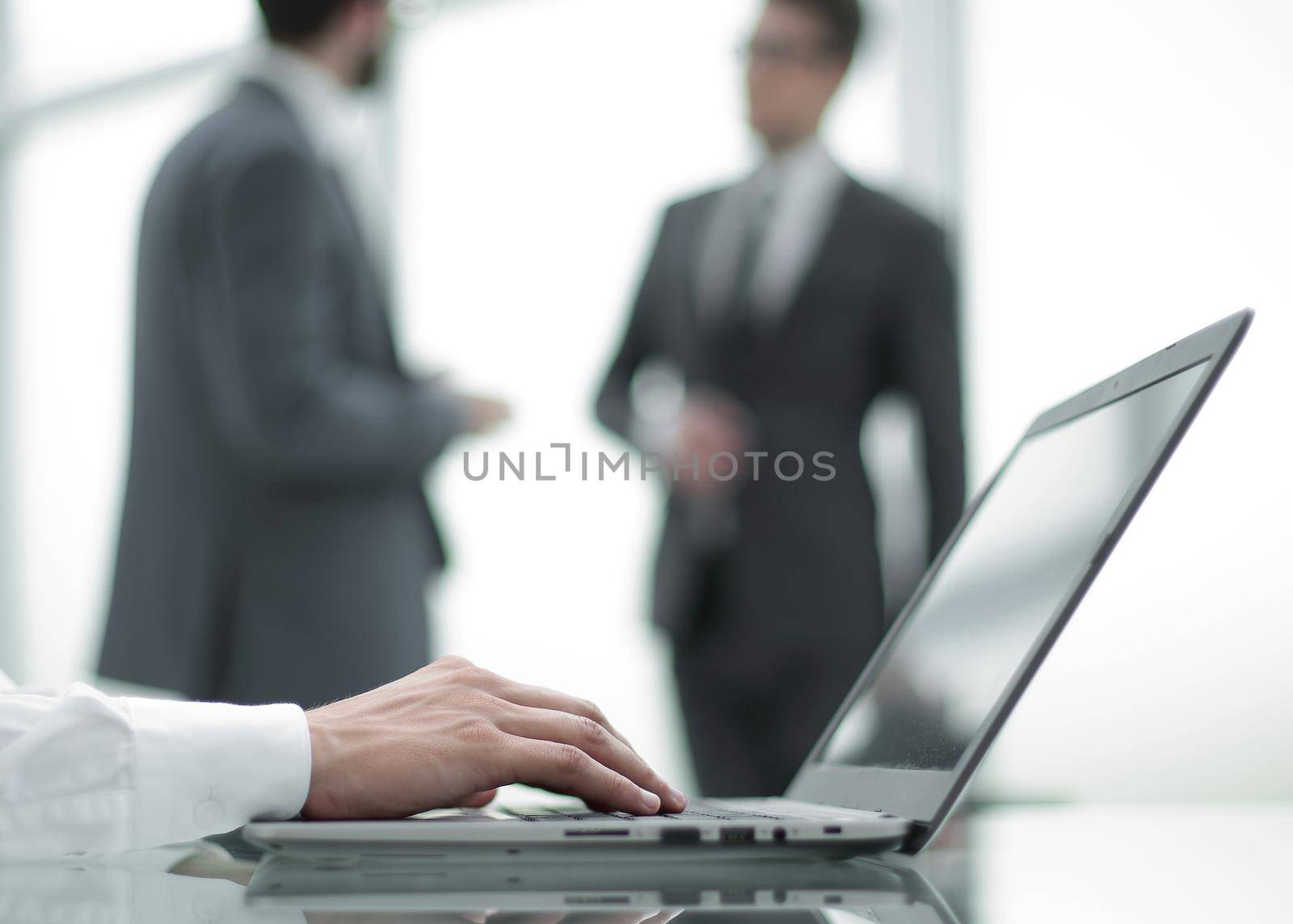 close up.businessman typing on a laptop.people and technology