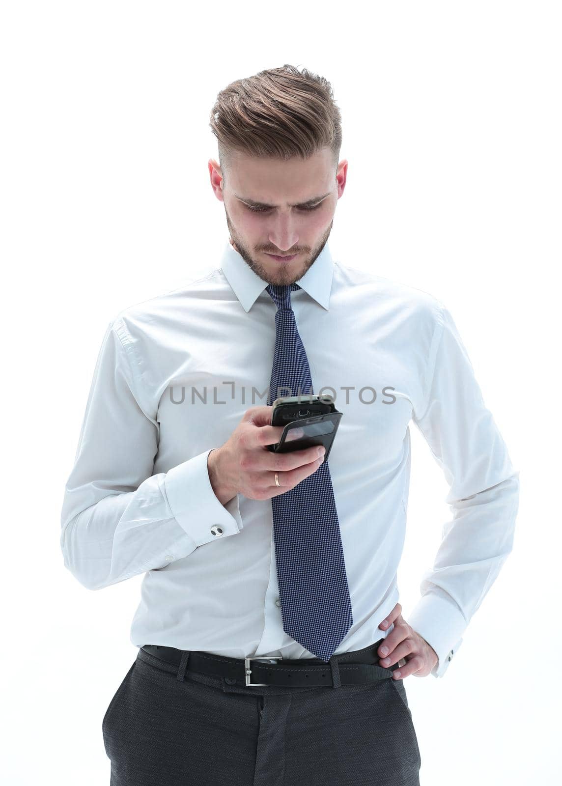 close up.handsome businessman reading text message on smartphone.isolated on white