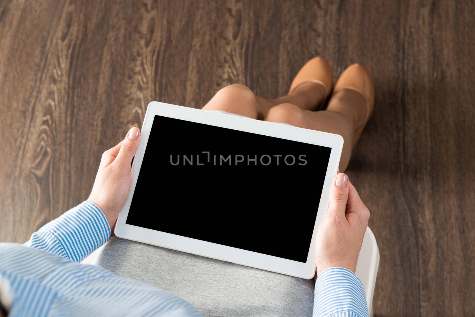 business woman with tablet on her lap by adam121