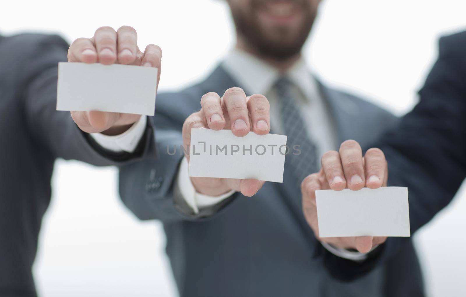 business people showing their business cards.business concept
