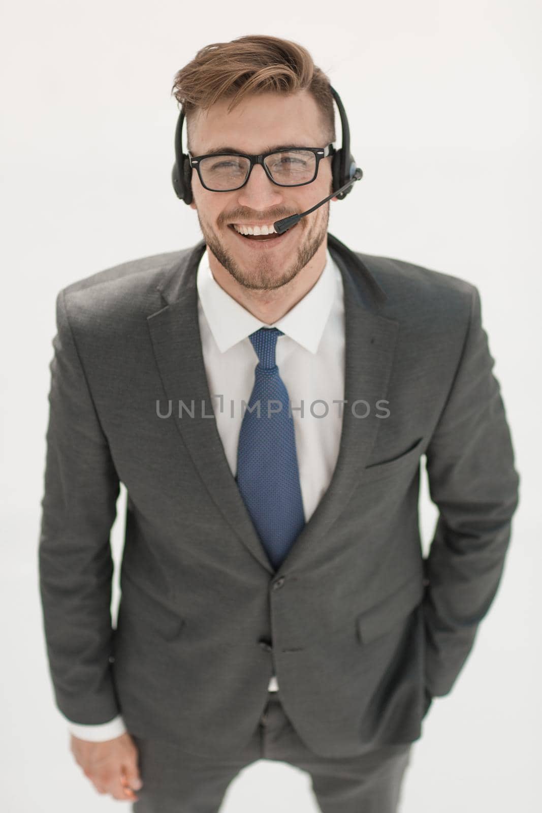 close up.smiling call center employee .isolated on white