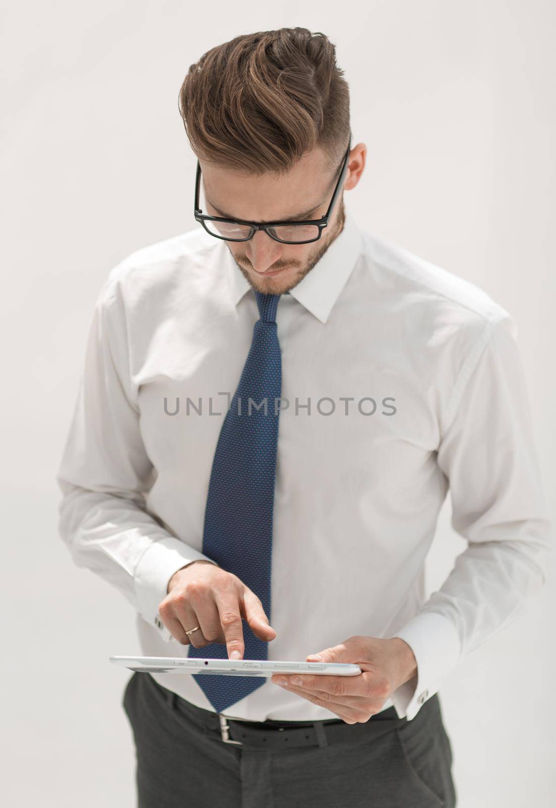 close up.modern business man using digital tablet. people and technology