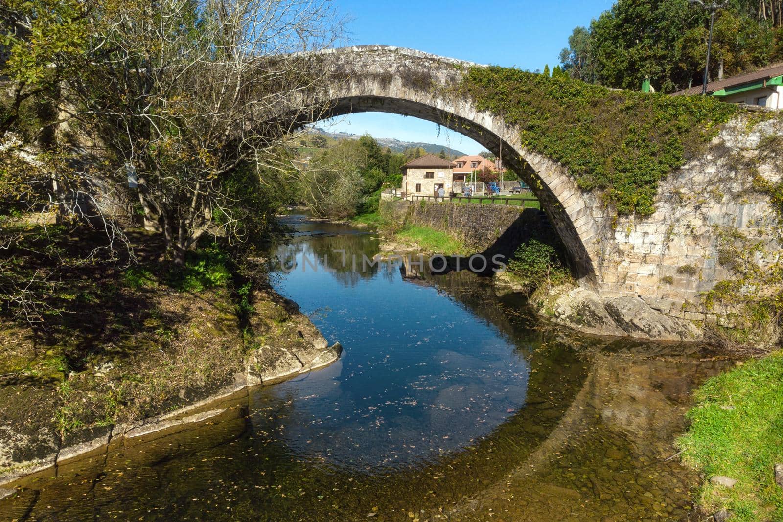 Aerial view of a scenic medieval bridge in Lierganes, Cantabria, Spain. High quality photo