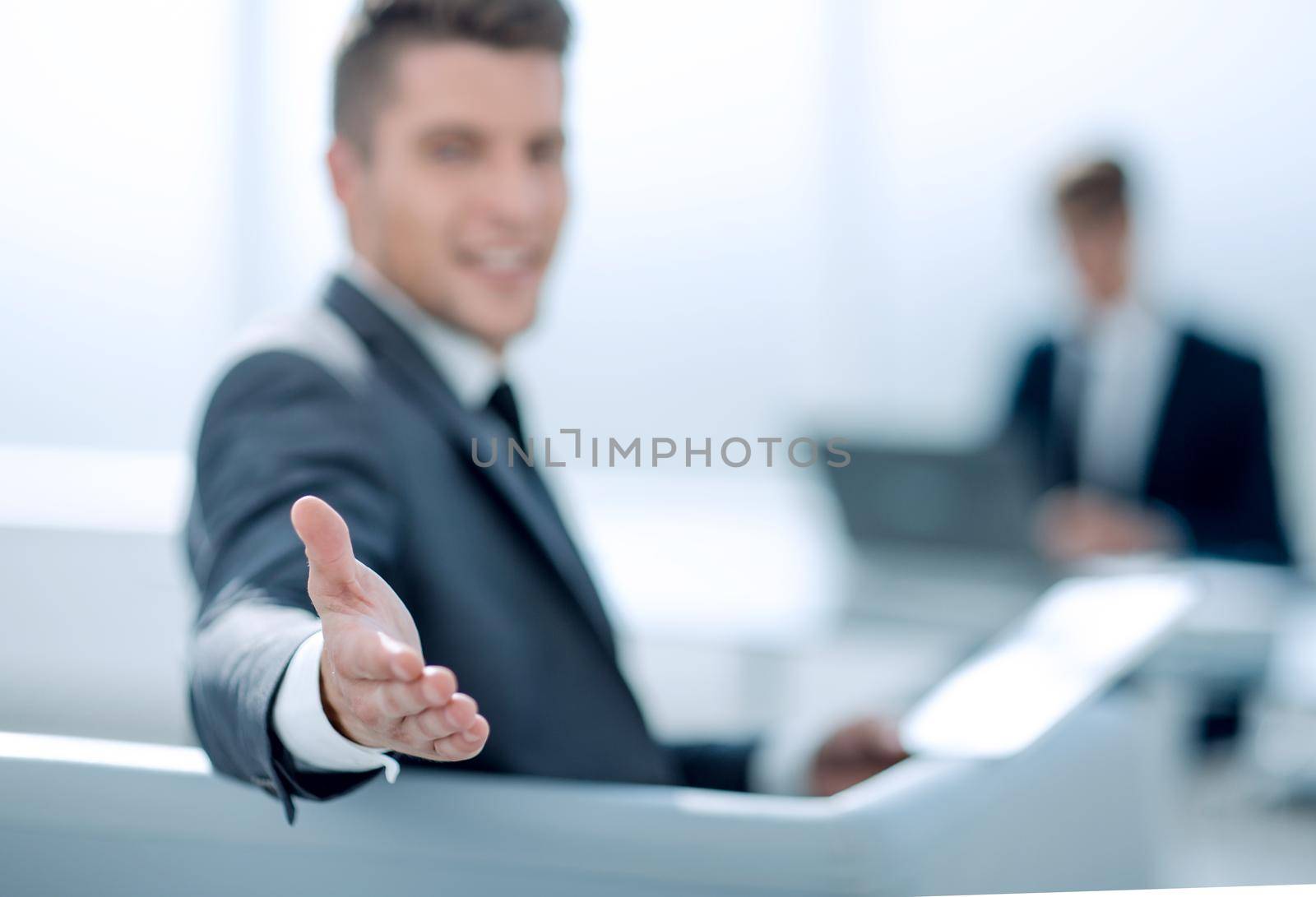 businessman shows thumb up by asdf
