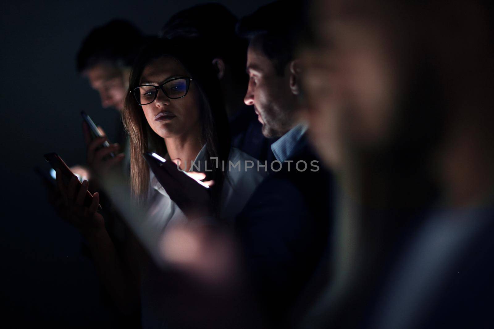 close up.image of colleagues with gadgets.people and technology