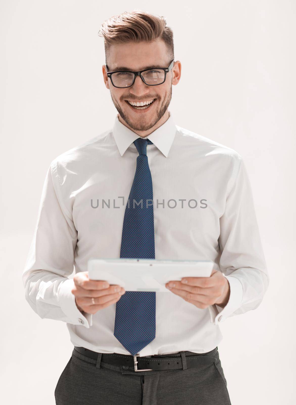 close up. smiling businessman with digital tablet by asdf
