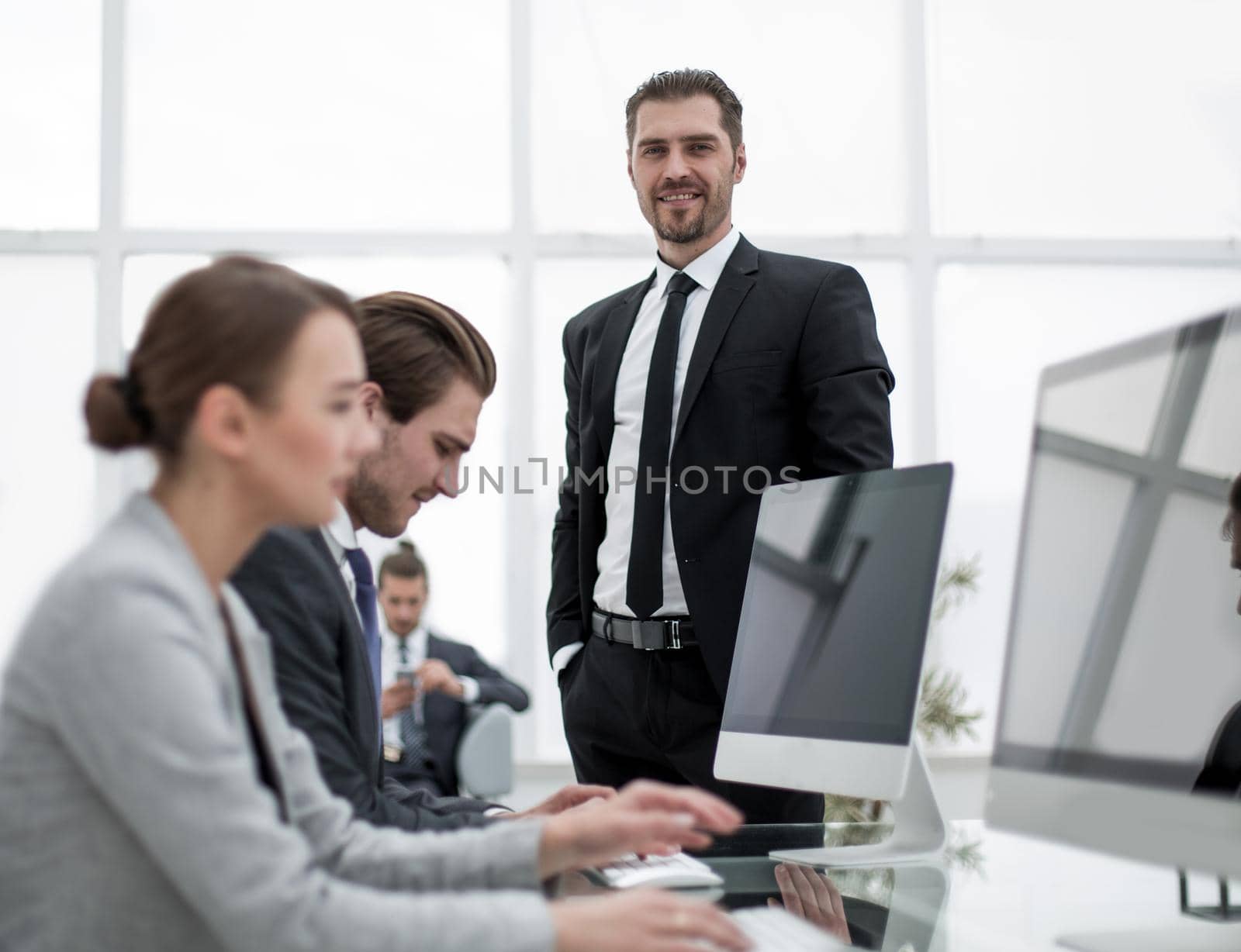 businessman standing in his office.photo with copy space
