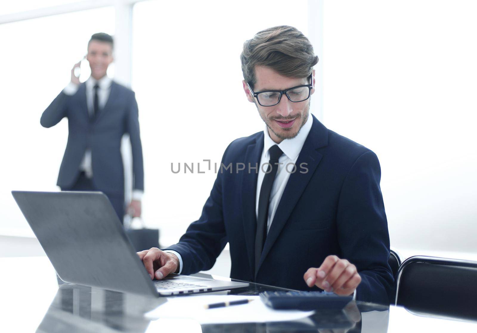 Two businessman in office with devices by asdf