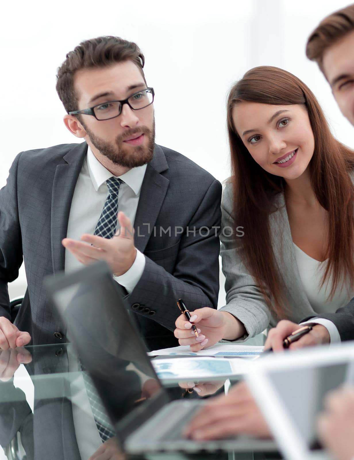 business team discussing a financial report.