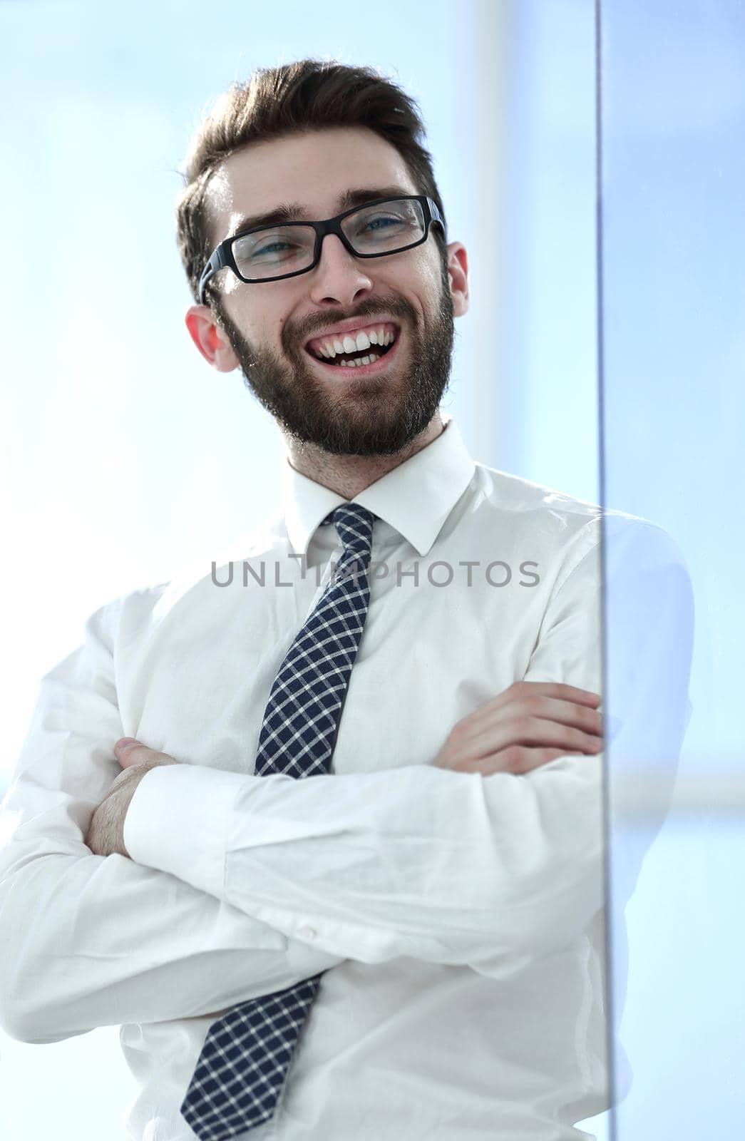 close up.portrait of a successful young businessman. by asdf