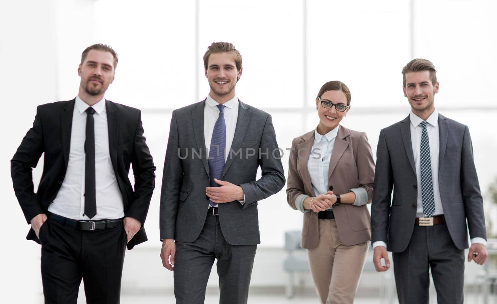 business colleagues in a modern office. the concept of teamwork