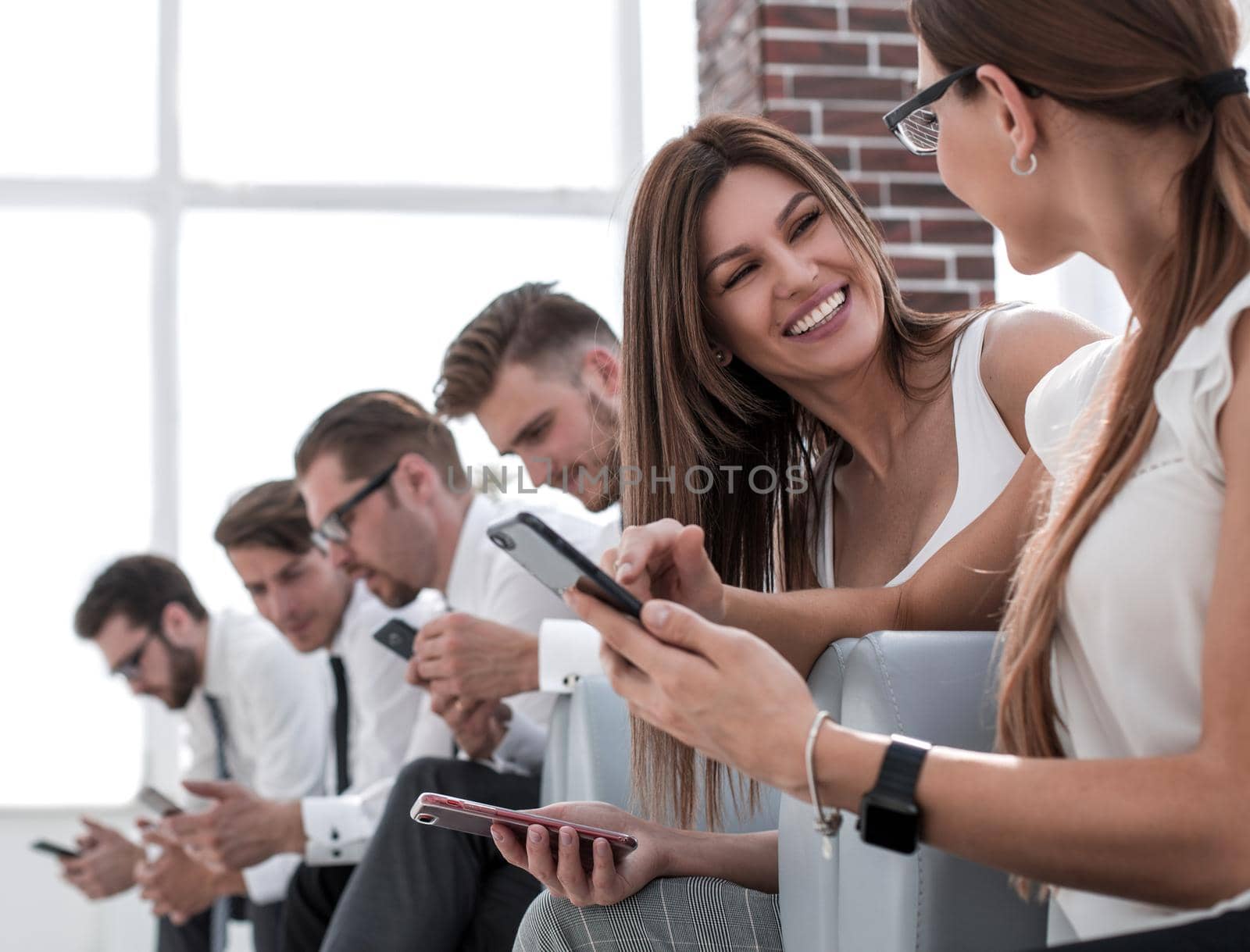 employees discussing something in the waiting room.photo with copy space
