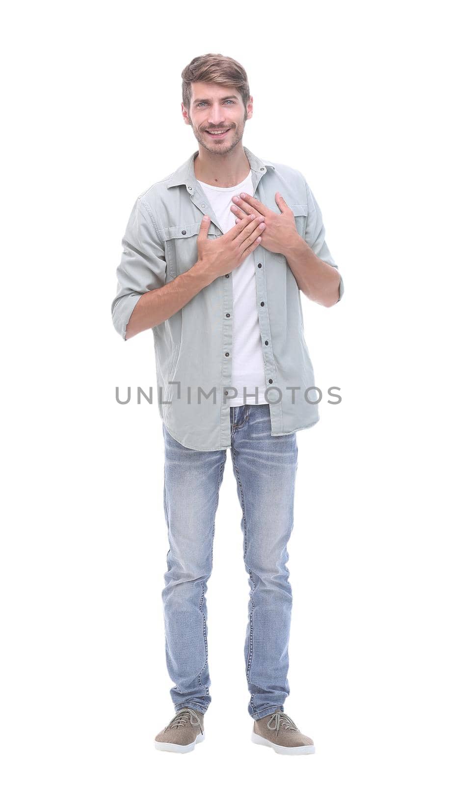 in full growth. portrait of a friendly young man .isolated on white background
