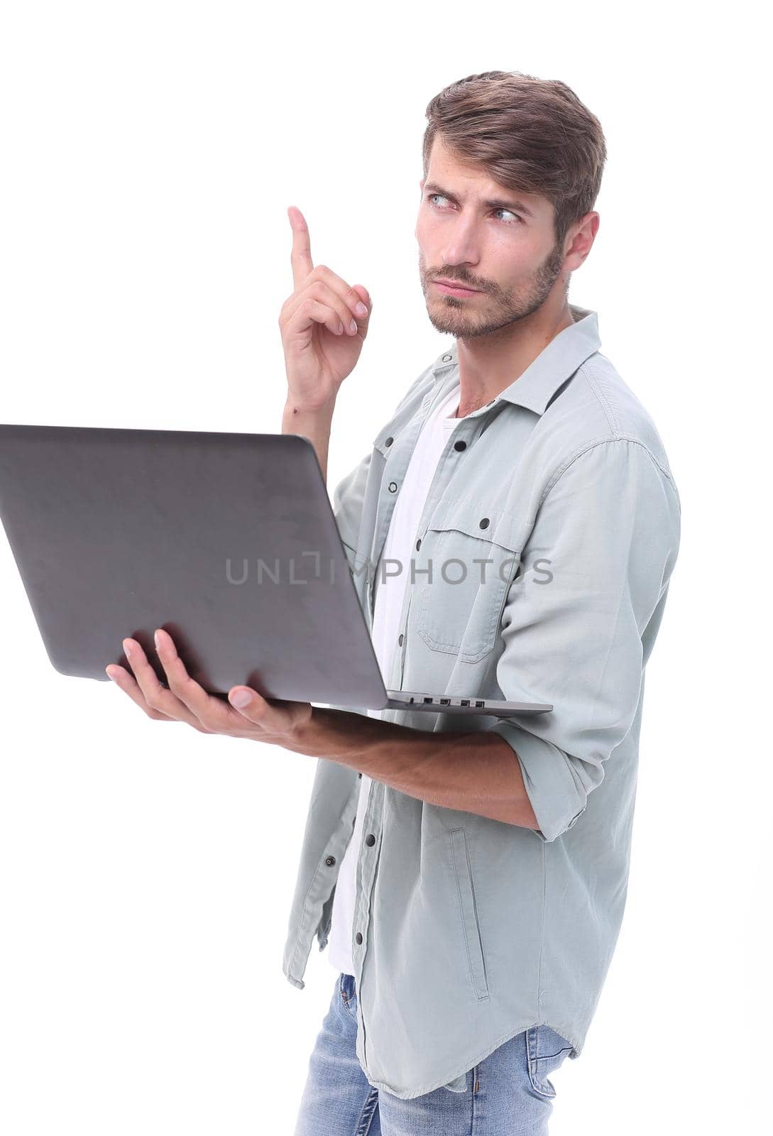 close up. brooding guy with a laptop .isolated on white background
