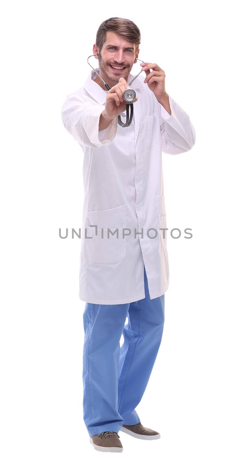 in full growth. attentive doctor therapist with stethoscope .isolated on white background