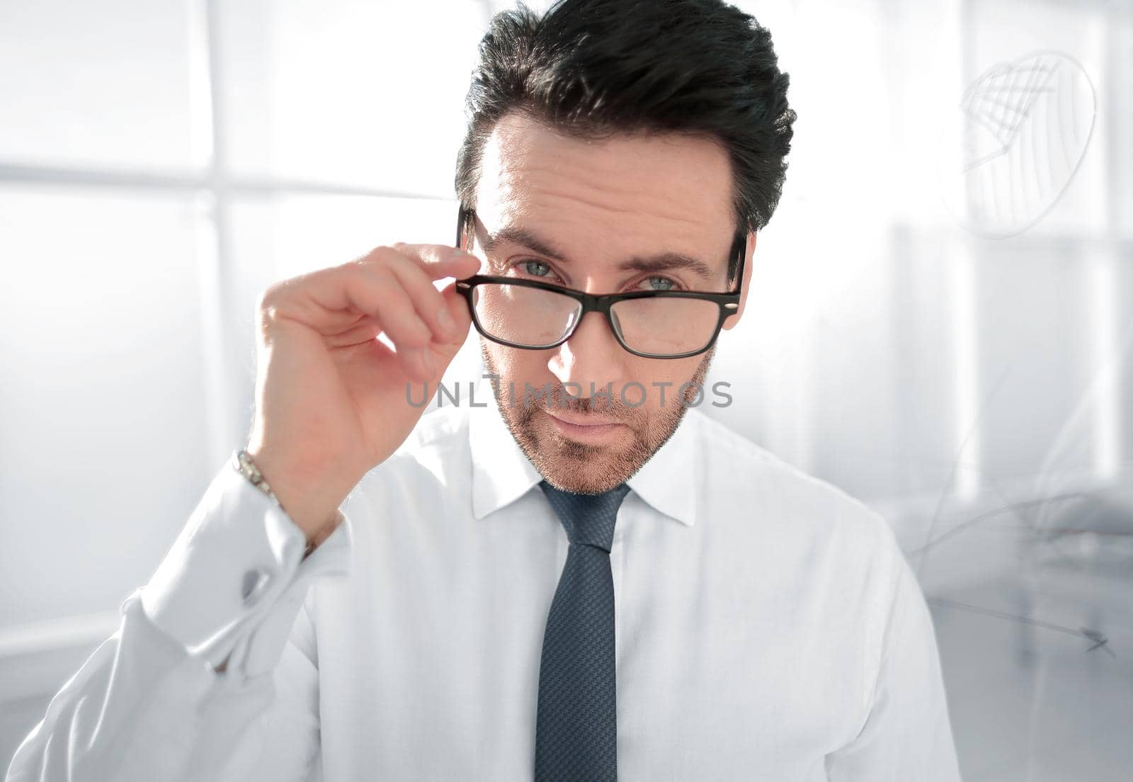 attentive businessman standing in the office.business people