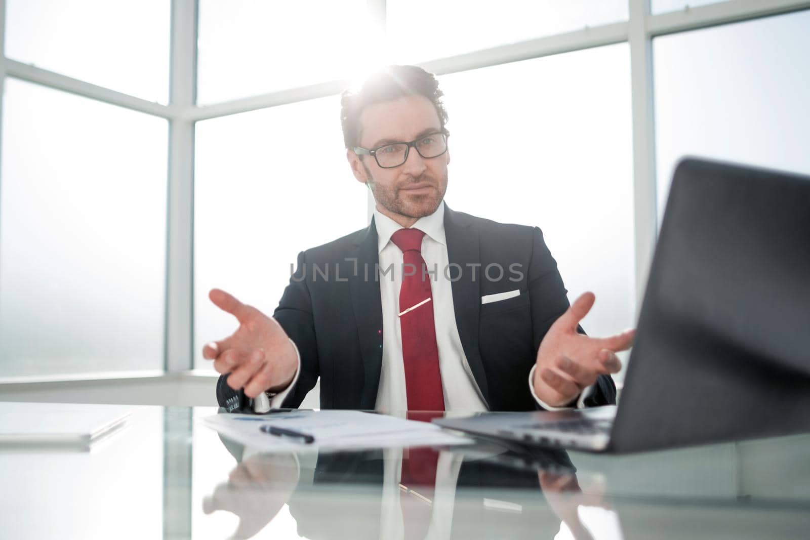 close up.businessman sitting at his Desk by asdf