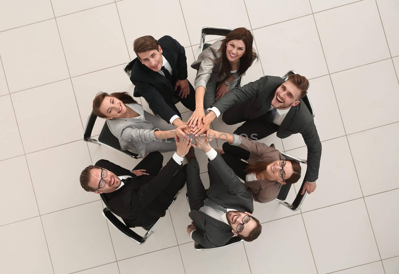 top view.business team showing their unity.the concept of teamwork