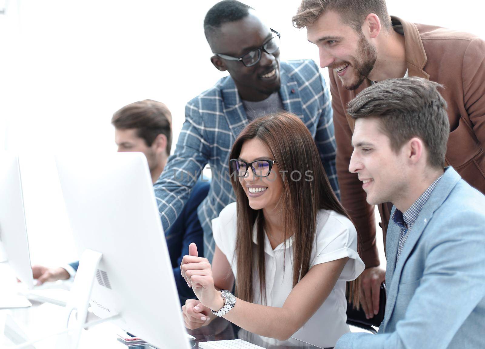 Company employees working in software development and designer office.Full concentration at work