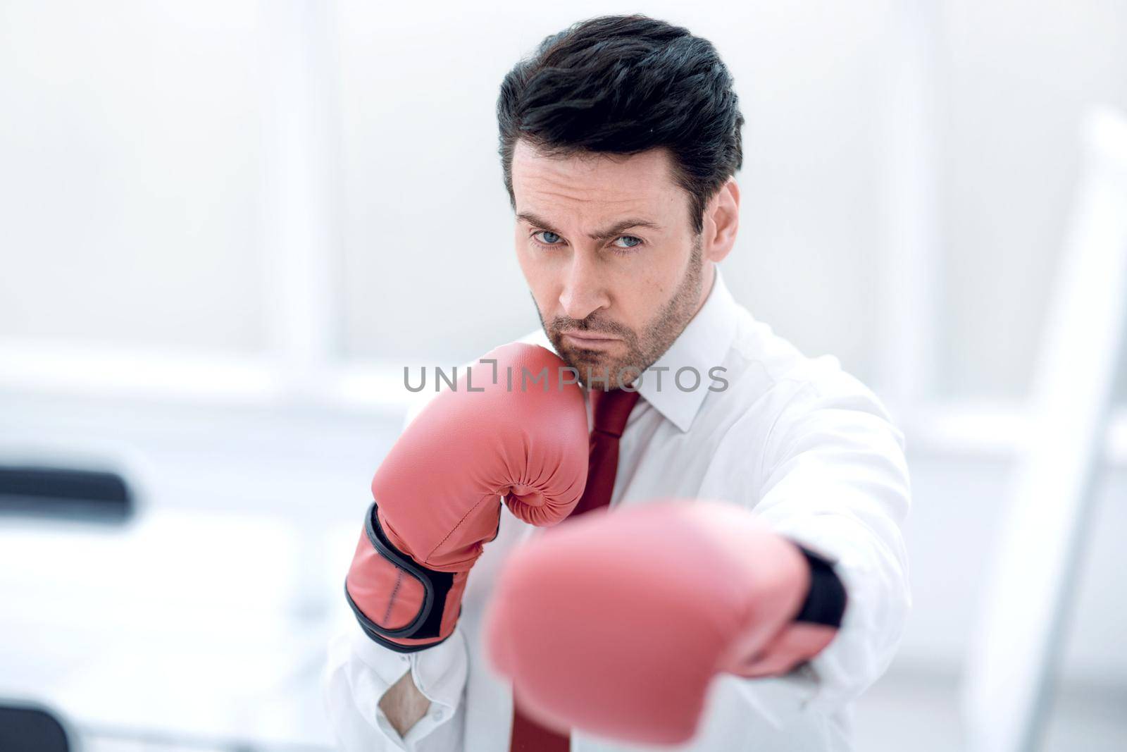 businessman in red Boxing gloves.isolated on white background