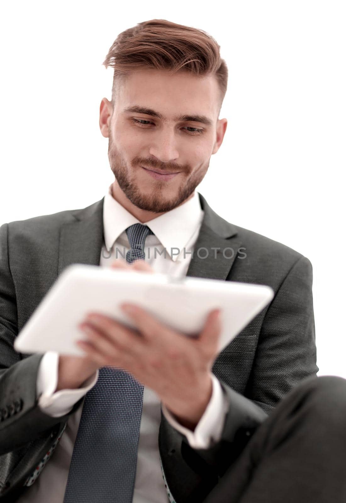 close up.modern businessman with digital tablet.people and technology.